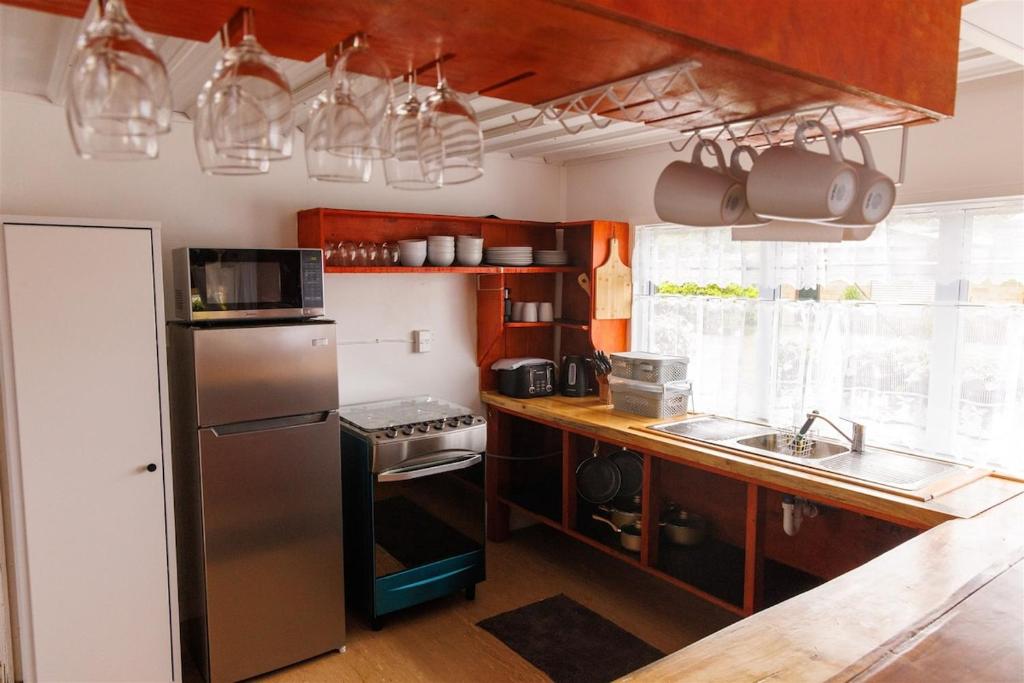 Kuchyň nebo kuchyňský kout v ubytování Atiu Guest House - Are Manuiri
