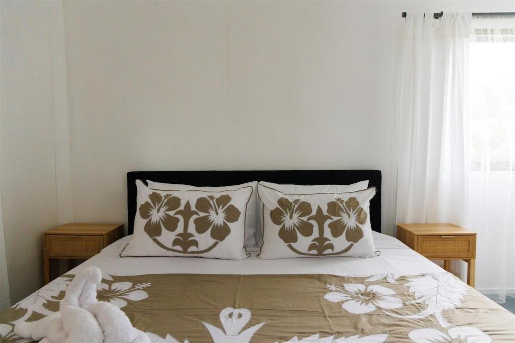 Postel nebo postele na pokoji v ubytování Atiu Guest House - Are Manuiri
