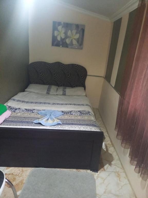 Postel nebo postele na pokoji v ubytování Mera Hostel