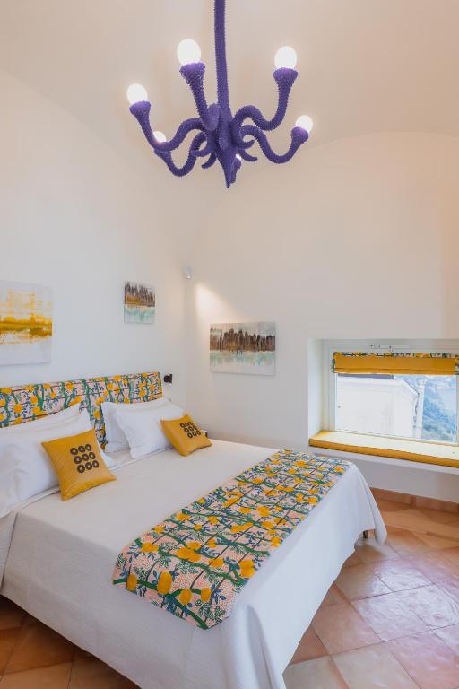 Postel nebo postele na pokoji v ubytování Five Positano