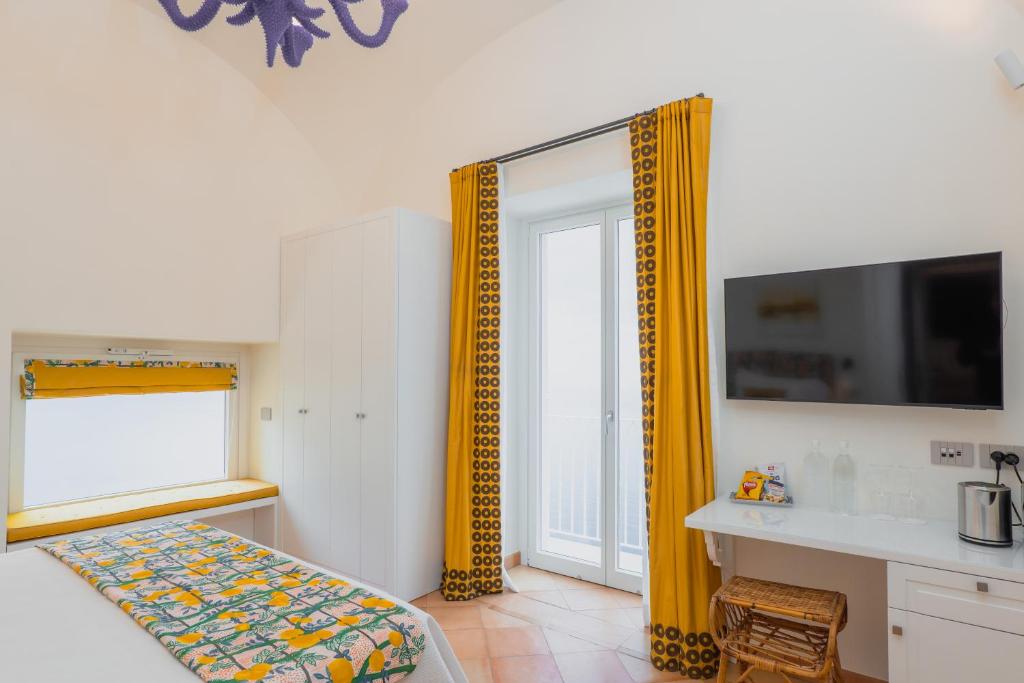Postel nebo postele na pokoji v ubytování Five Positano