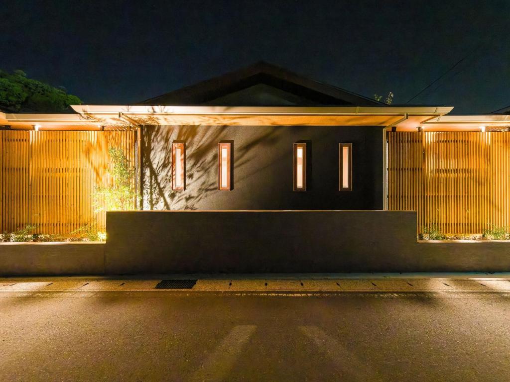 a house with lights on the side of it at Houokan - Vacation STAY 96414v in Tateyama