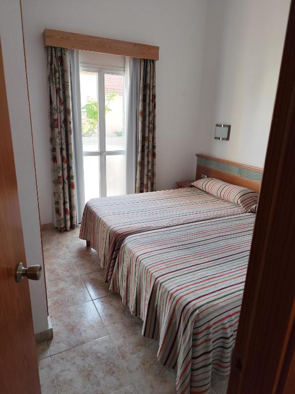 Postel nebo postele na pokoji v ubytování Espacio privilegiado y céntrico