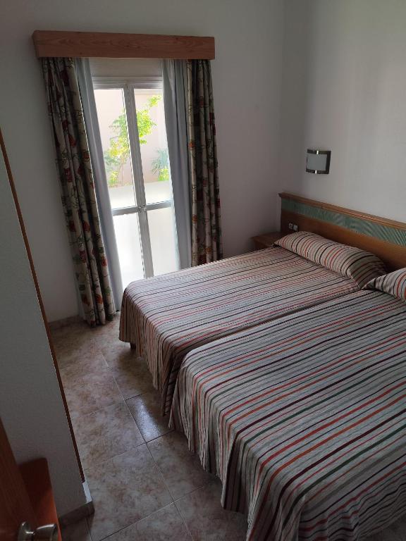 Postel nebo postele na pokoji v ubytování Espacio privilegiado y céntrico