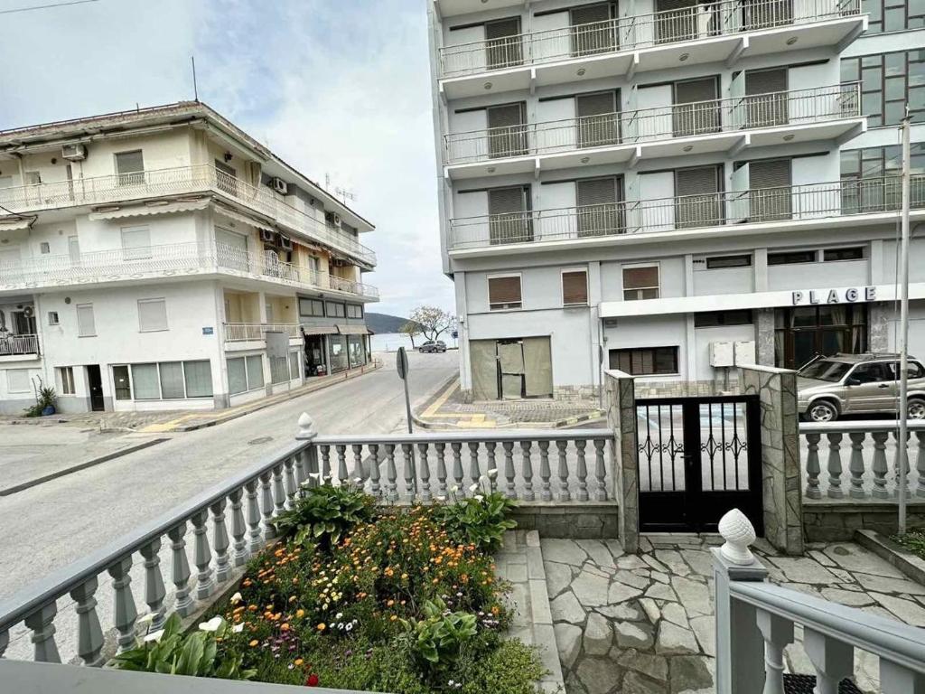 a view of a street with a building at Sand Blue Nea Peramos in Néa Péramos
