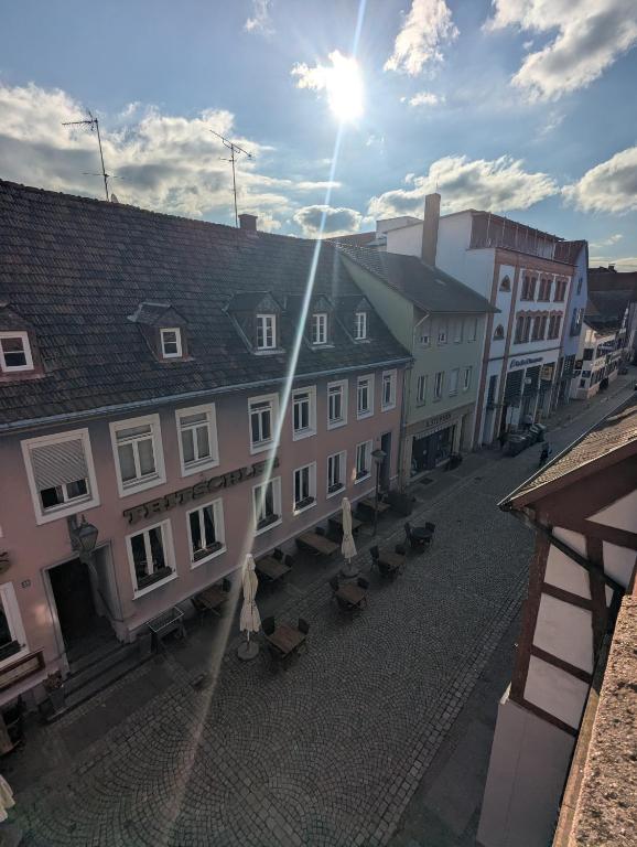 an overhead view of a city street with buildings at Rooftop-Apartment Citylage in Offenburg