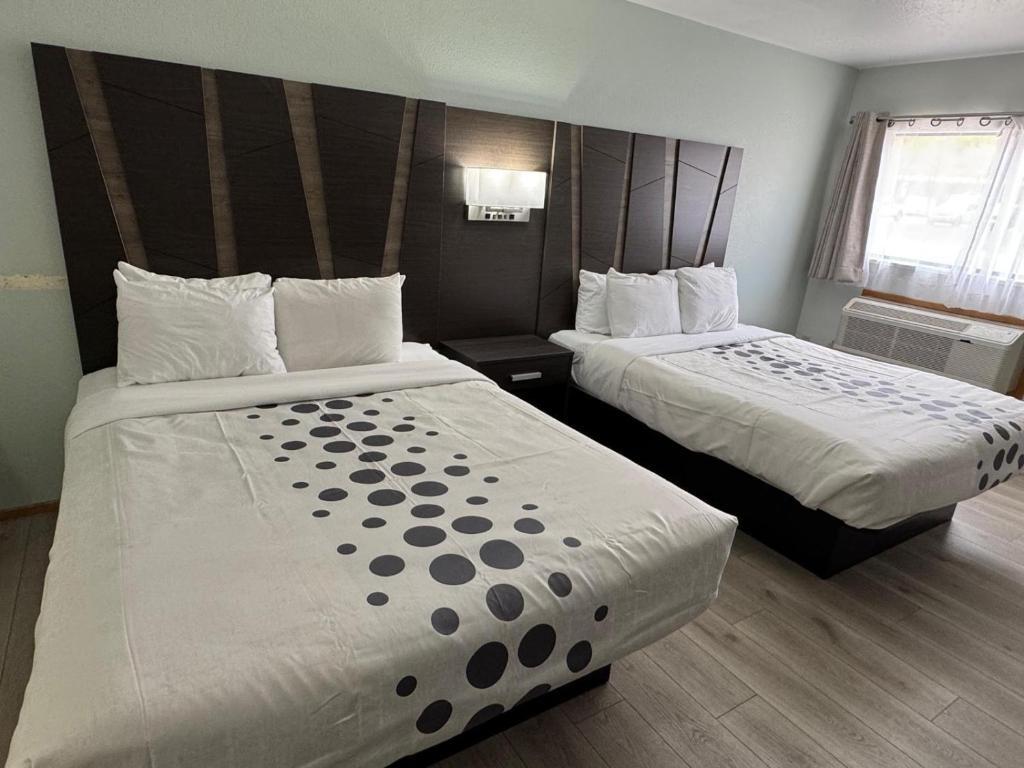 Postel nebo postele na pokoji v ubytování Hotel 191 - Moab