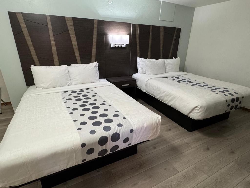 Postel nebo postele na pokoji v ubytování Hotel 191 - Moab