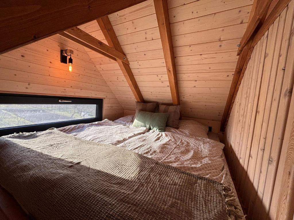 Voodi või voodid majutusasutuse Tiny house Pálava toas