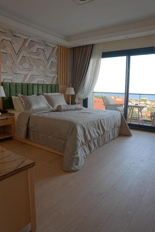 Postel nebo postele na pokoji v ubytování Datca Suites Luxury Boutuiqe Hotel