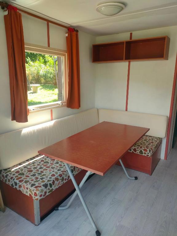 Postel nebo postele na pokoji v ubytování Camping Canopée
