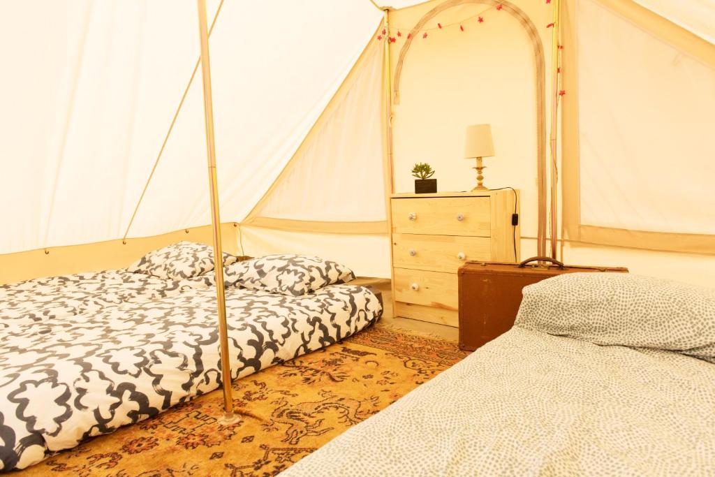 Postel nebo postele na pokoji v ubytování Aparra Surfcamp Auberge Capbreton