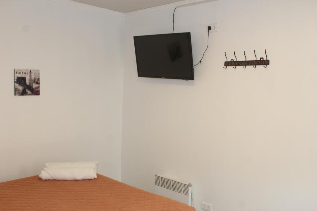 TV a/nebo společenská místnost v ubytování Habitación con baño privado independiente