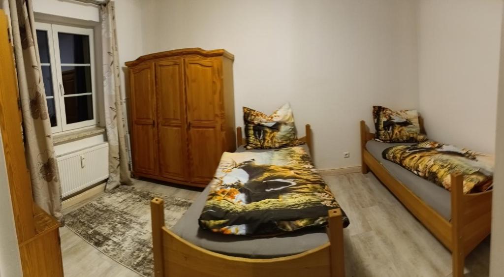 Postel nebo postele na pokoji v ubytování Ferienwohnung Finkenberg