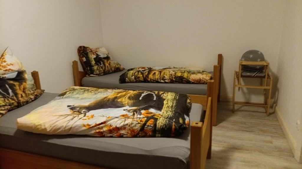 Postel nebo postele na pokoji v ubytování Ferienwohnung Finkenberg