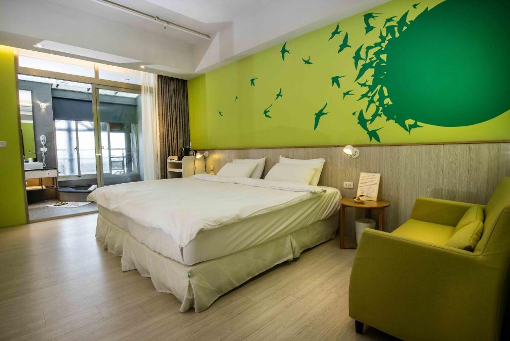 Postel nebo postele na pokoji v ubytování No. 9 Hotel