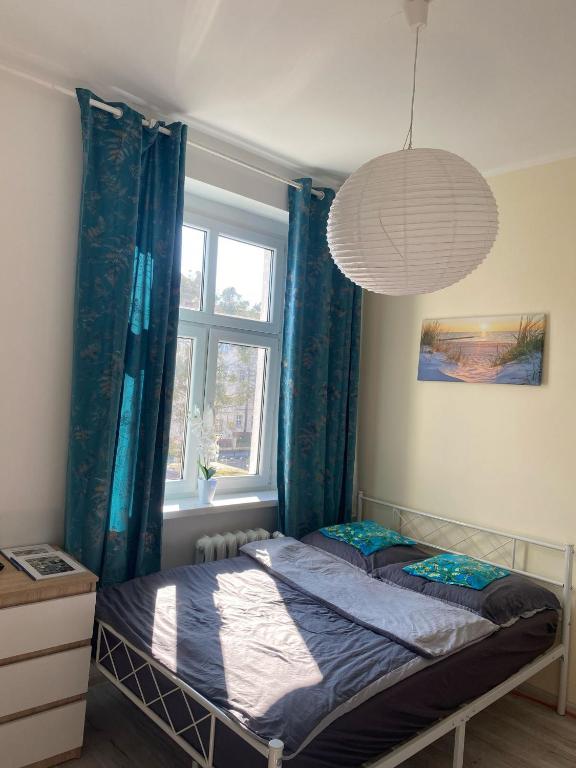 Postel nebo postele na pokoji v ubytování Magnolia Rooms