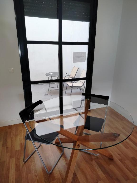 A seating area at Apartamentos Centro Cordoba by MiRa