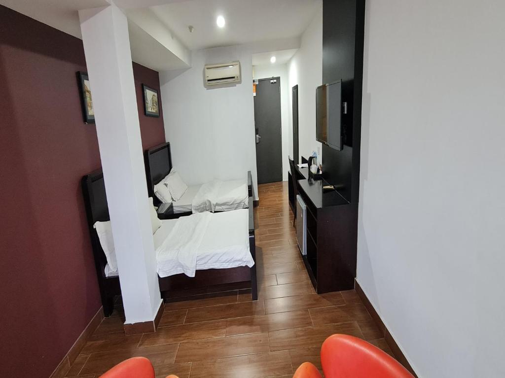 Postel nebo postele na pokoji v ubytování Hotel O Crossroads Hotel