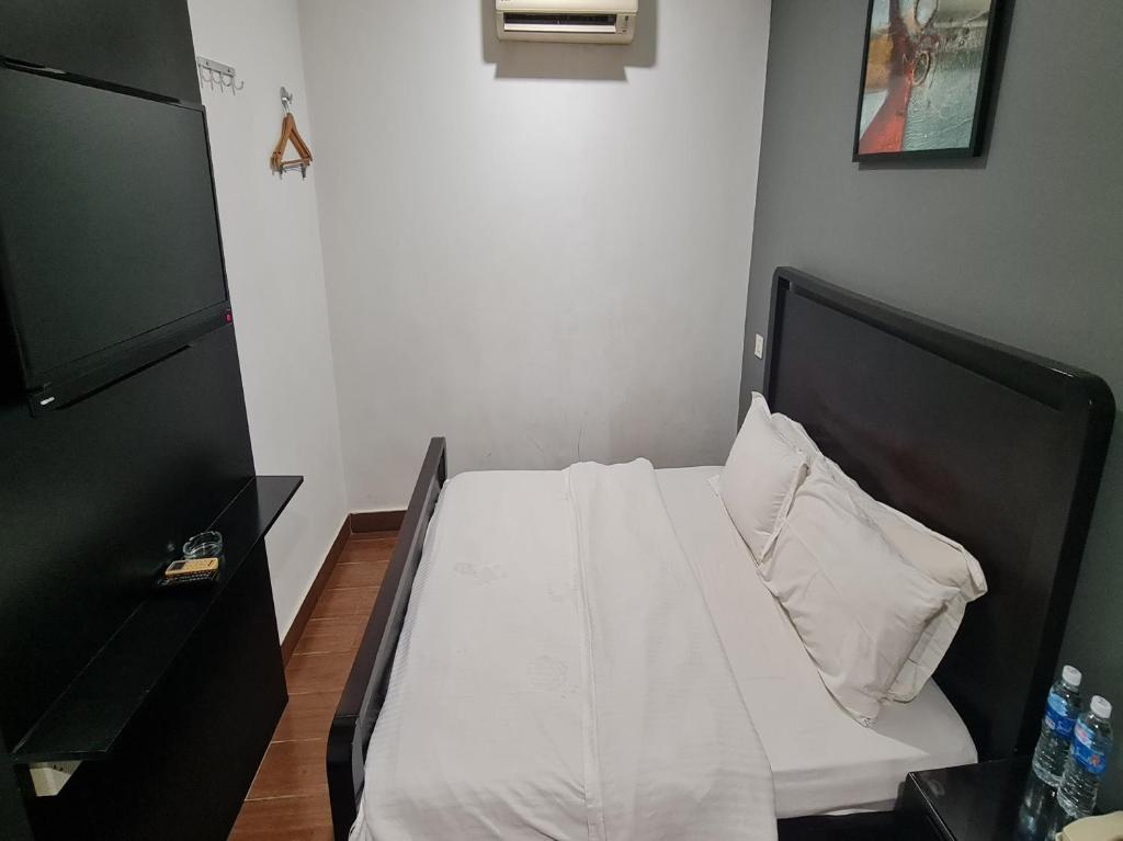 Postel nebo postele na pokoji v ubytování Hotel O Crossroads Hotel