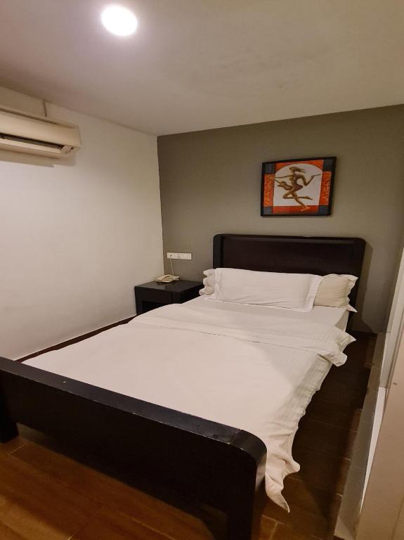 Postel nebo postele na pokoji v ubytování Hotel O Crossroads Hotel