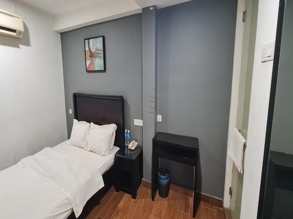 Postel nebo postele na pokoji v ubytování Hotel O Crossroads Hotel