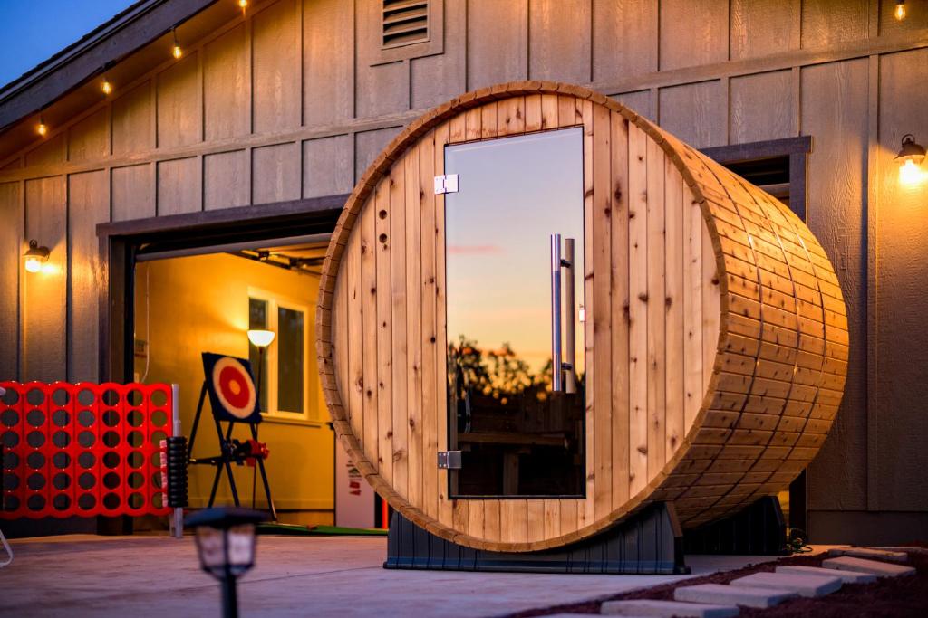 a large wooden door on the side of a building at Gateway Getaway in Williams