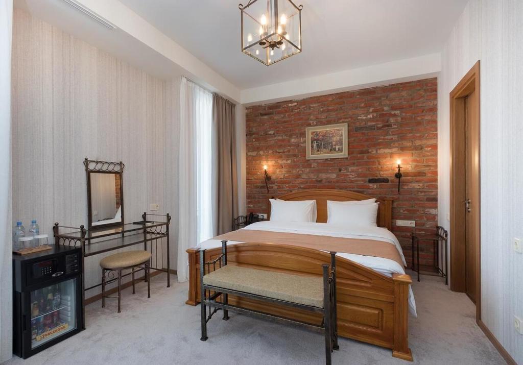 Postel nebo postele na pokoji v ubytování Hotel Flames