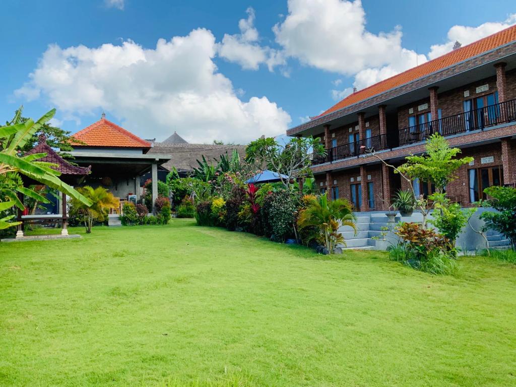 Κήπος έξω από το Putu Homestay