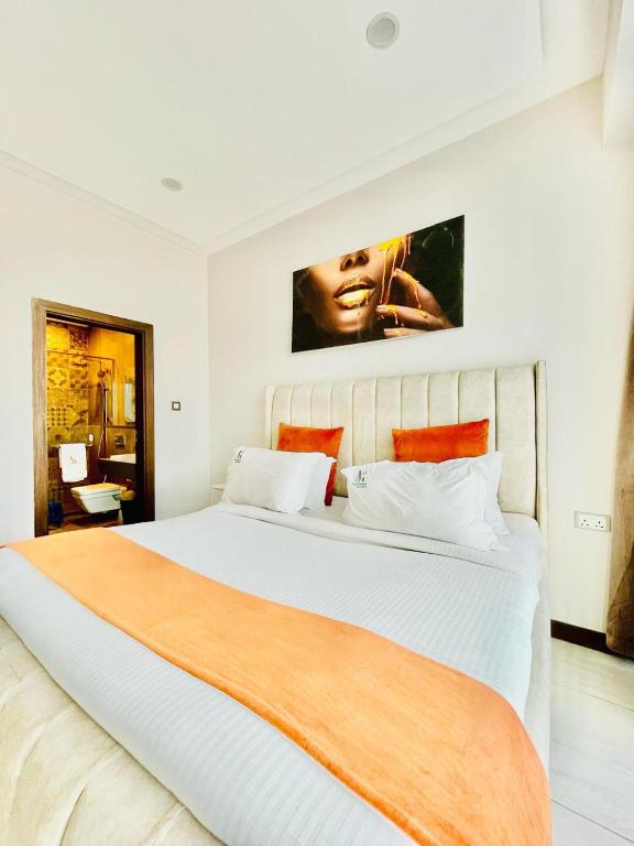 Postel nebo postele na pokoji v ubytování Skynest Residences Nairobi, Westlands