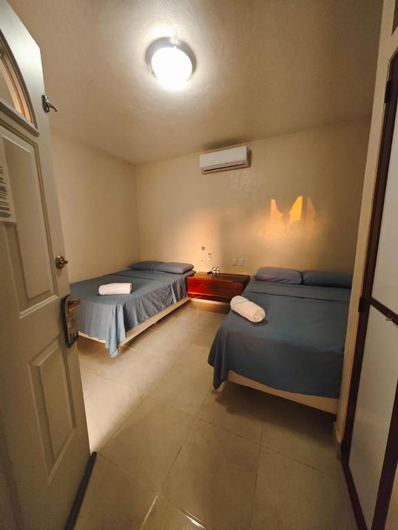 Postel nebo postele na pokoji v ubytování Hotel Mirador Maya Calakmul