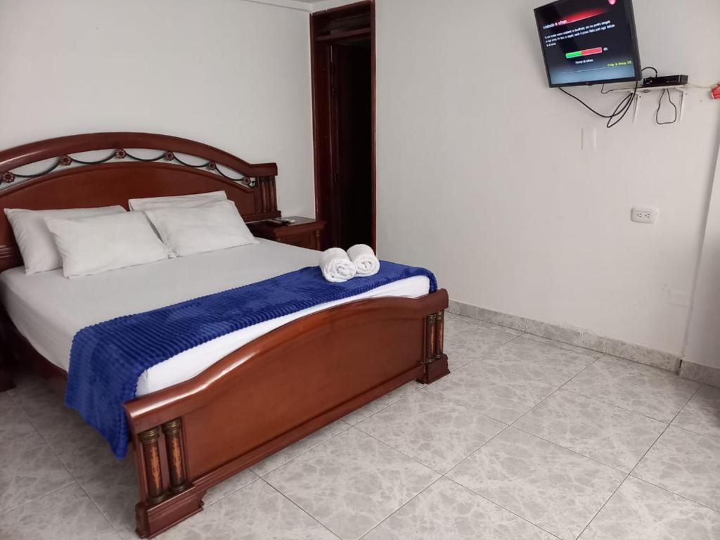 Postel nebo postele na pokoji v ubytování Hotel El Danubio Campestre