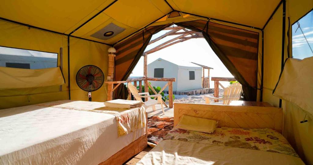 Postel nebo postele na pokoji v ubytování Glamping EcoLodge Cueva De Las Aguilas