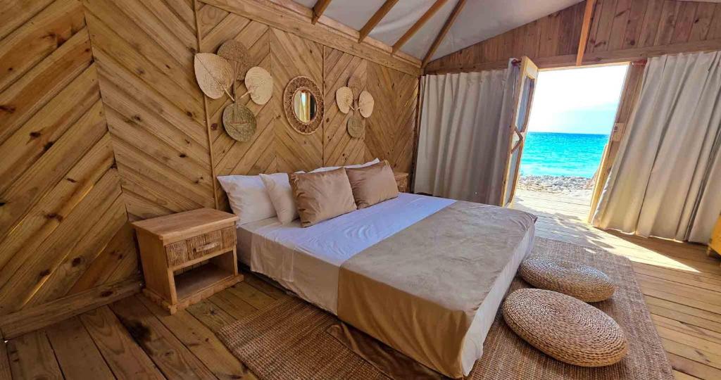 Postel nebo postele na pokoji v ubytování Glamping EcoLodge Cueva De Las Aguilas
