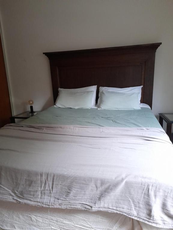 Cama o camas de una habitación en Barrio cívico