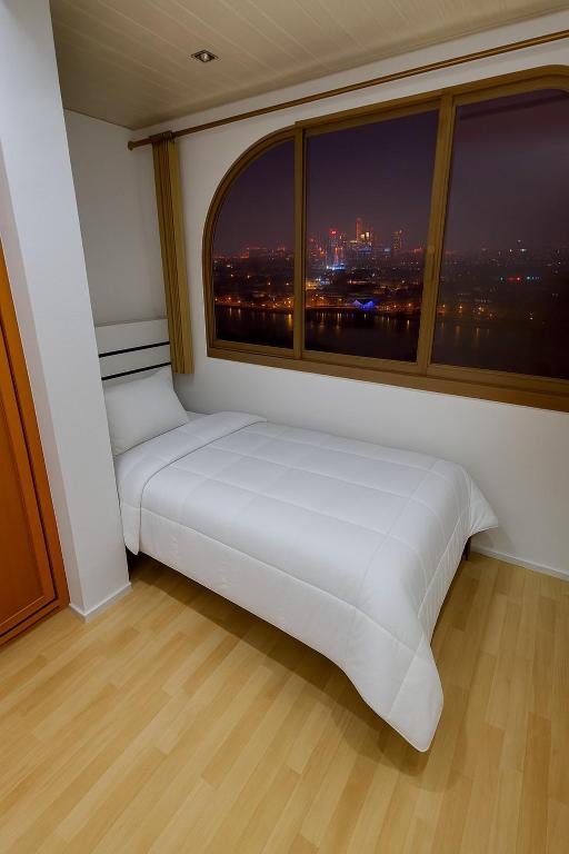Letto o letti in una camera di Platinum Pavilion