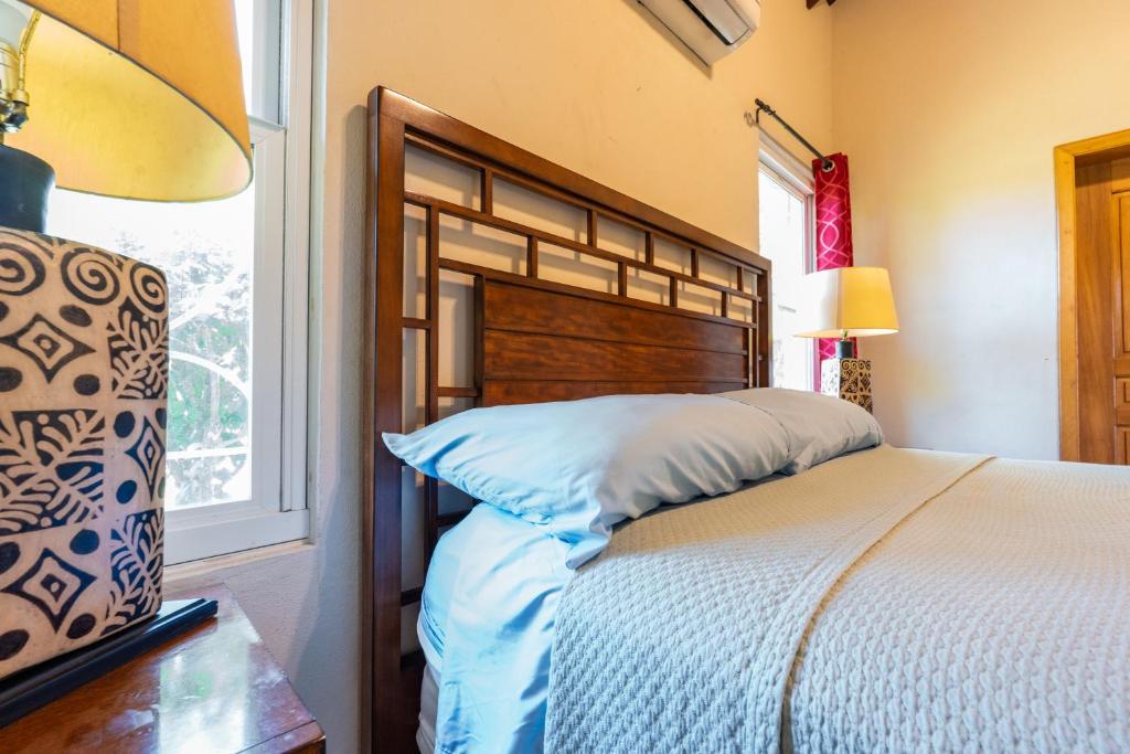 Postel nebo postele na pokoji v ubytování Casa De Odisea