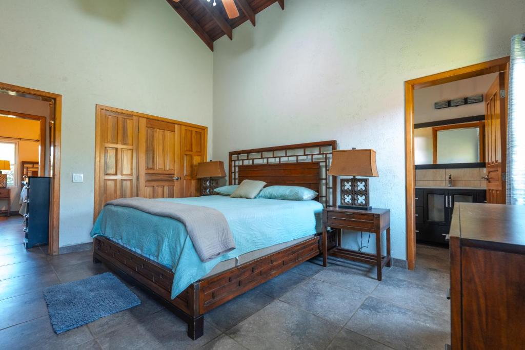 Postel nebo postele na pokoji v ubytování Casa De Odisea
