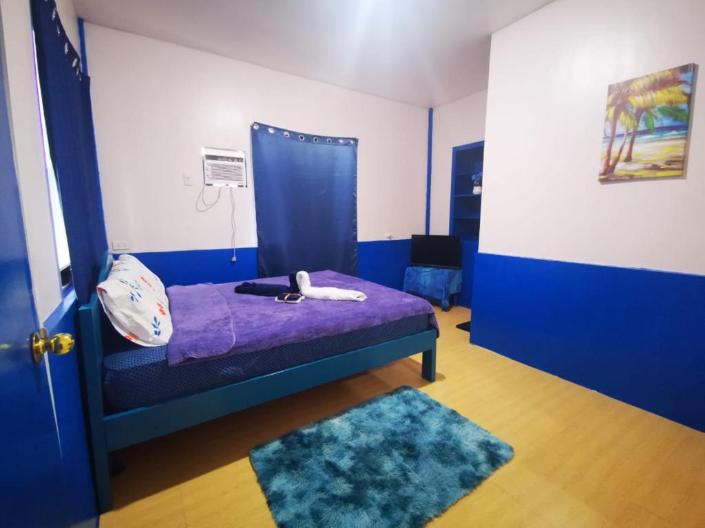 Postel nebo postele na pokoji v ubytování B'lu Bamboo