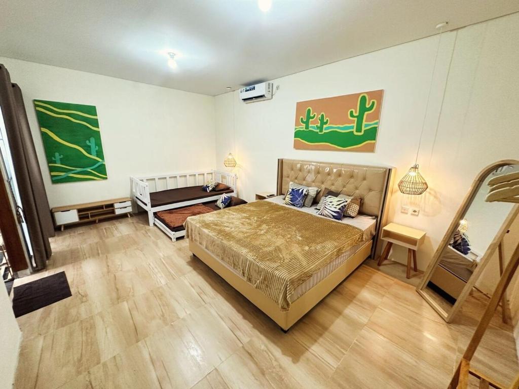 Postel nebo postele na pokoji v ubytování Villa Manalagi