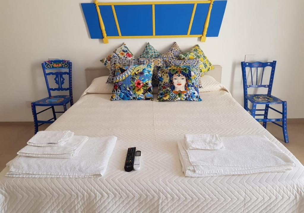 Posteľ alebo postele v izbe v ubytovaní Casa Vacanze Brezza di Gaffe