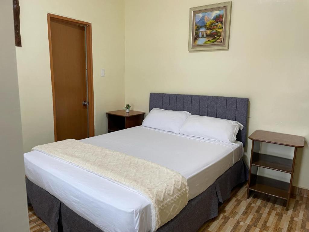 Postel nebo postele na pokoji v ubytování Whitesands Beach Resort