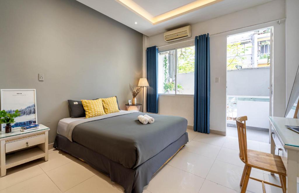 Ένα ή περισσότερα κρεβάτια σε δωμάτιο στο B Homestay Deluxe 01