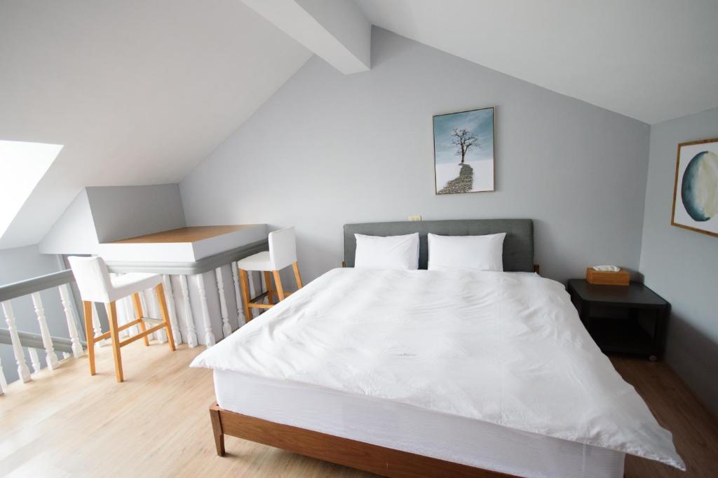 Postel nebo postele na pokoji v ubytování Green 58 B&B