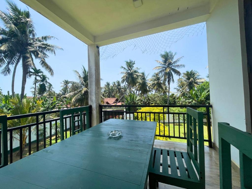 Balkón nebo terasa v ubytování Curly Hostel Negombo