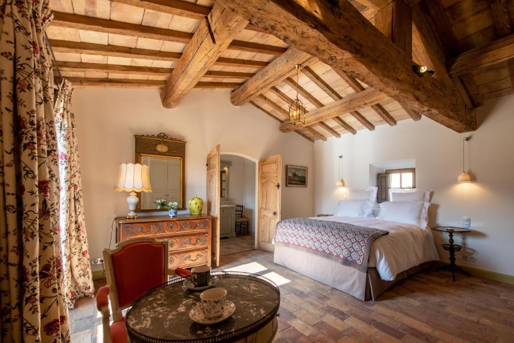 Postel nebo postele na pokoji v ubytování La Bastide