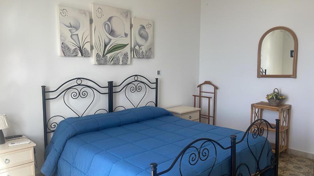 Postel nebo postele na pokoji v ubytování Casa Direttamente sul mare