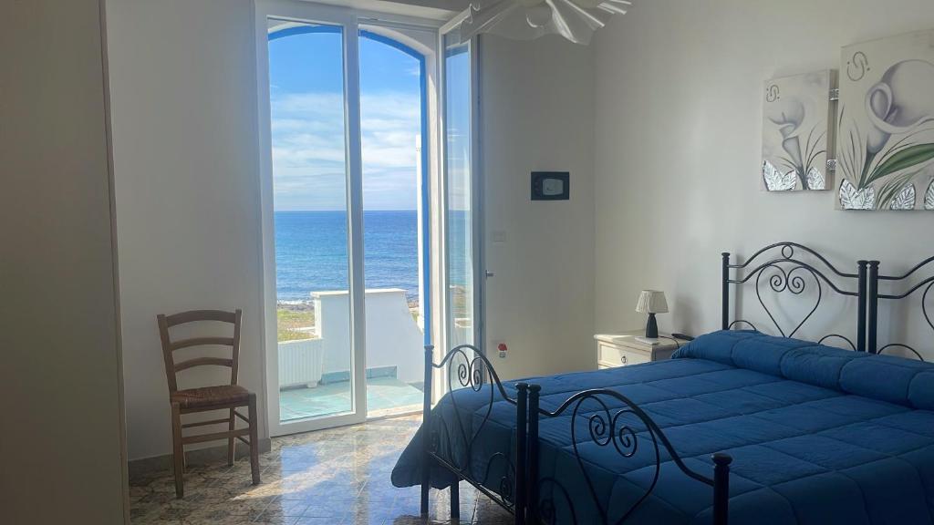 Postel nebo postele na pokoji v ubytování Casa Direttamente sul mare