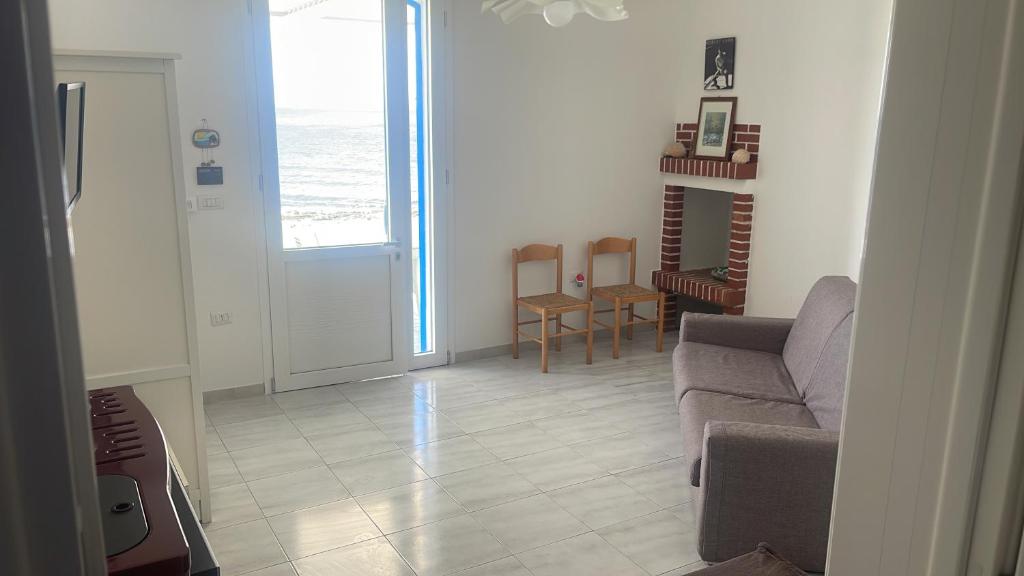 Posezení v ubytování Casa Direttamente sul mare