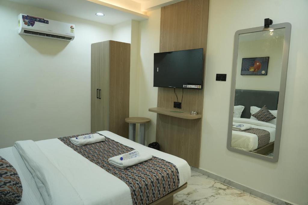 Postel nebo postele na pokoji v ubytování Hotel M Town